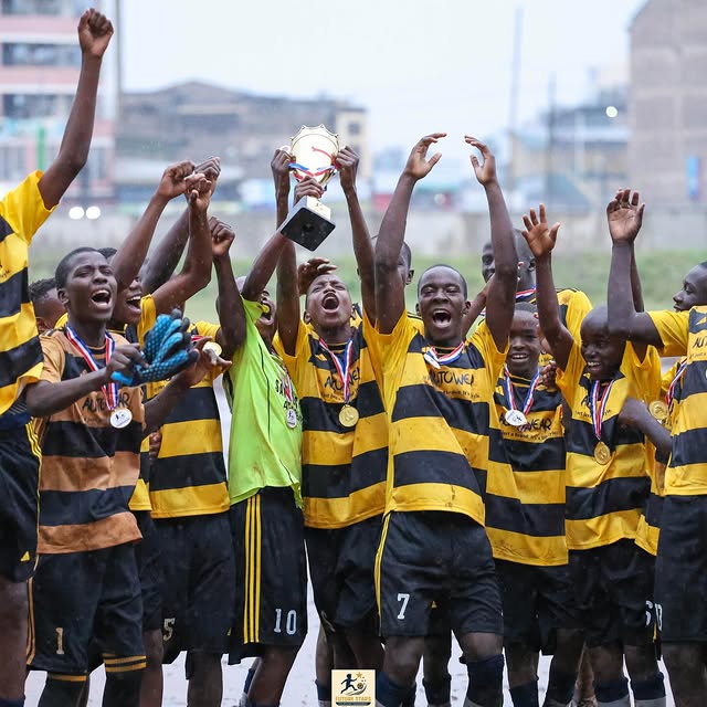 Santos Soka players celebrating a Future Stars trophy win