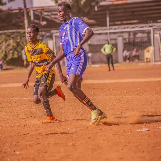 Santos Soka Academy — Yellow-and-black kit vs maroon on matchday