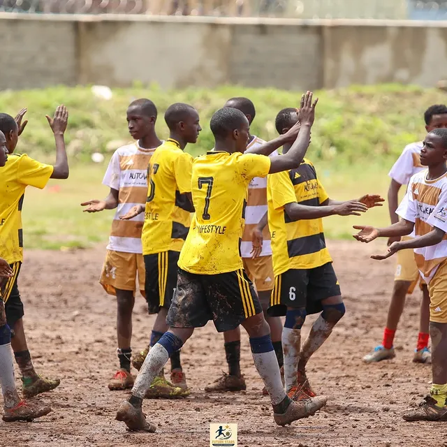 Santos Soka Academy — Celebrating as the trophy is lifted