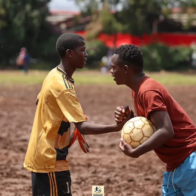 Santos Soka Under-12 players competing in a football match